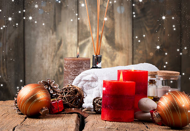 spa massage  setting, product, oil on wooden background, christmas concept