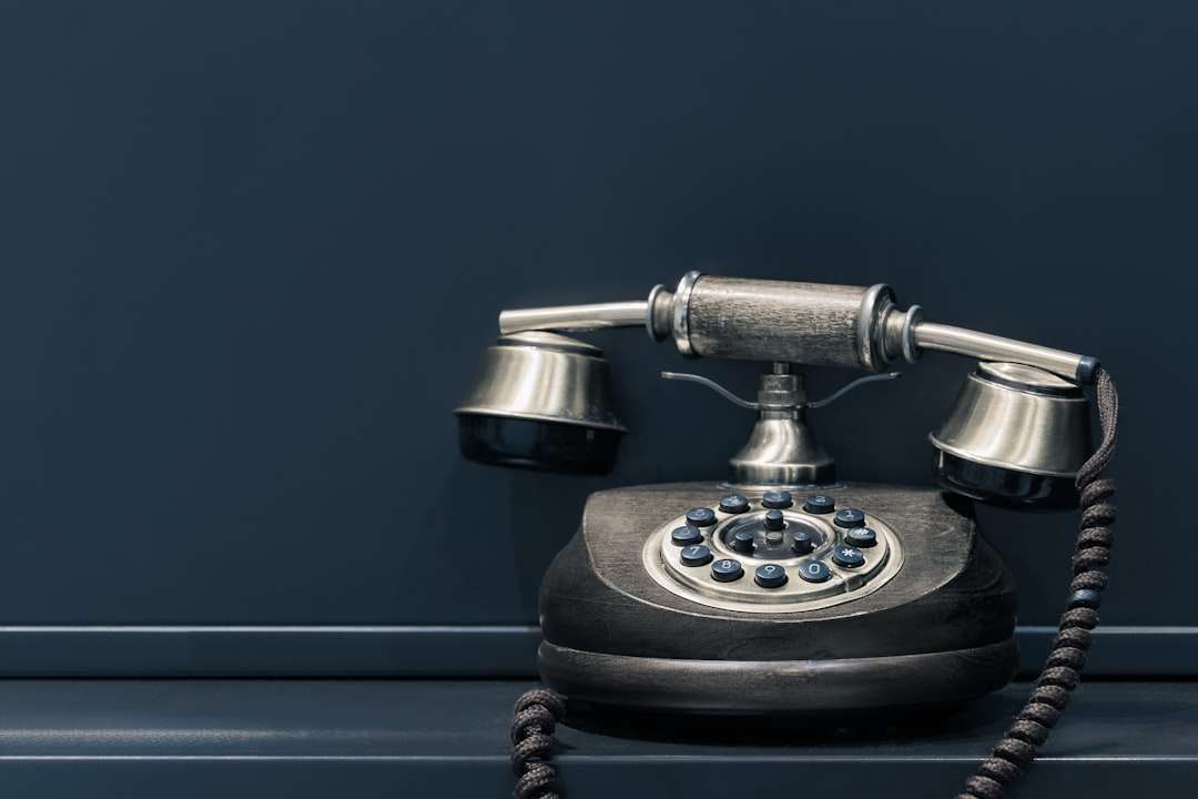 Greenwoods Hotel Vintage Telephone for Contact Page Classic vintage rotary telephone against a navy backdrop, symbolising traditional hospitality and contact at Greenwoods Hotel & Spa.