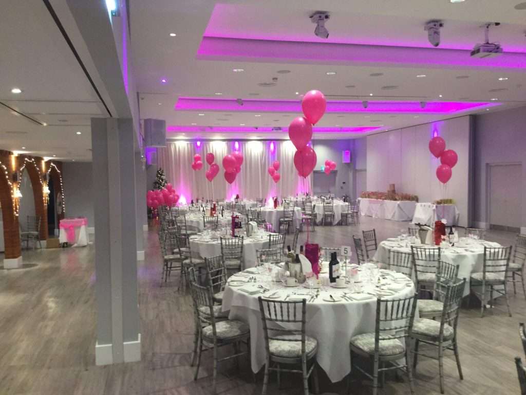 Pink balloon themed charity ball setup in the Garden Suite at Greenwoods Hotel, arranged by our event team for an elegant fundraising occasion.