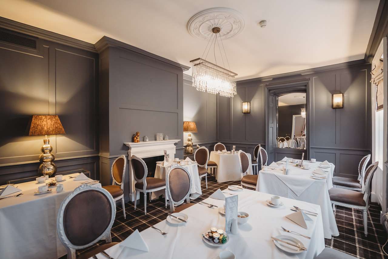 Elegant dining room setup at Greenwoods Ellis Restaurant