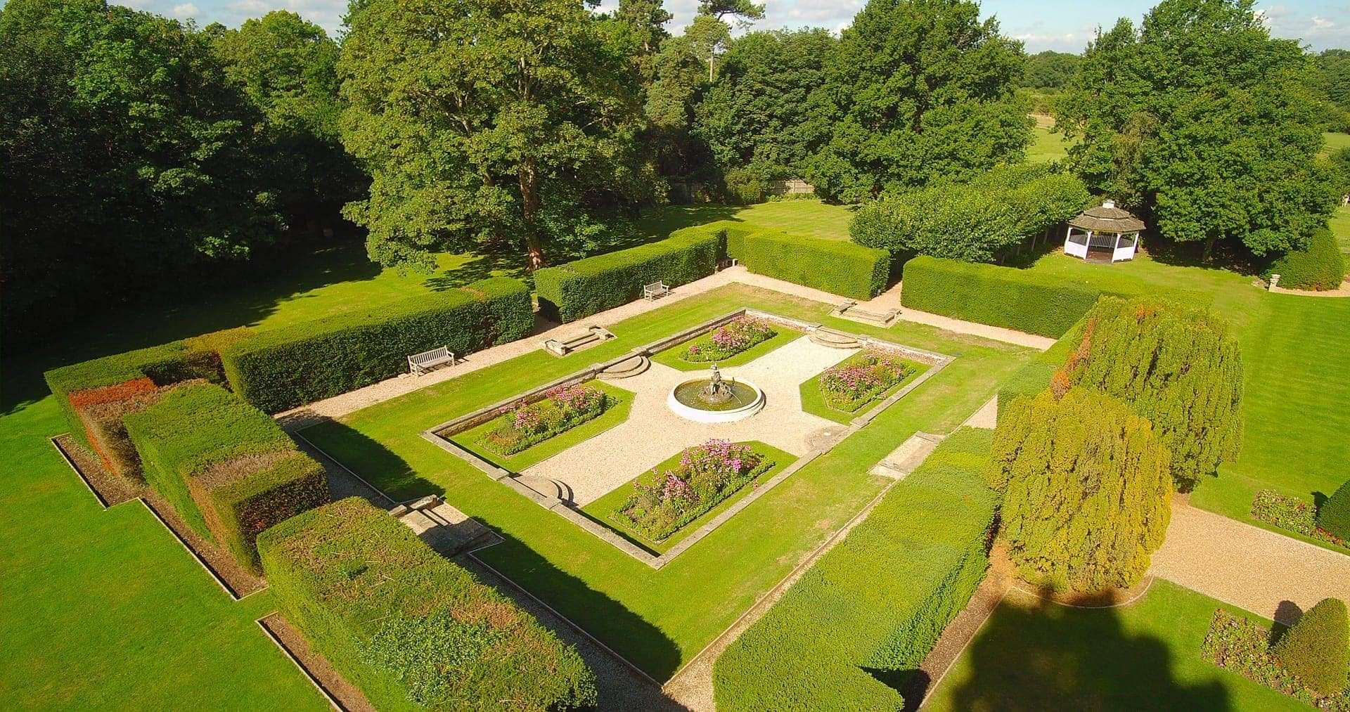 Birds eye view of Greenwoods Hotel's formal fountain gardens and hedging