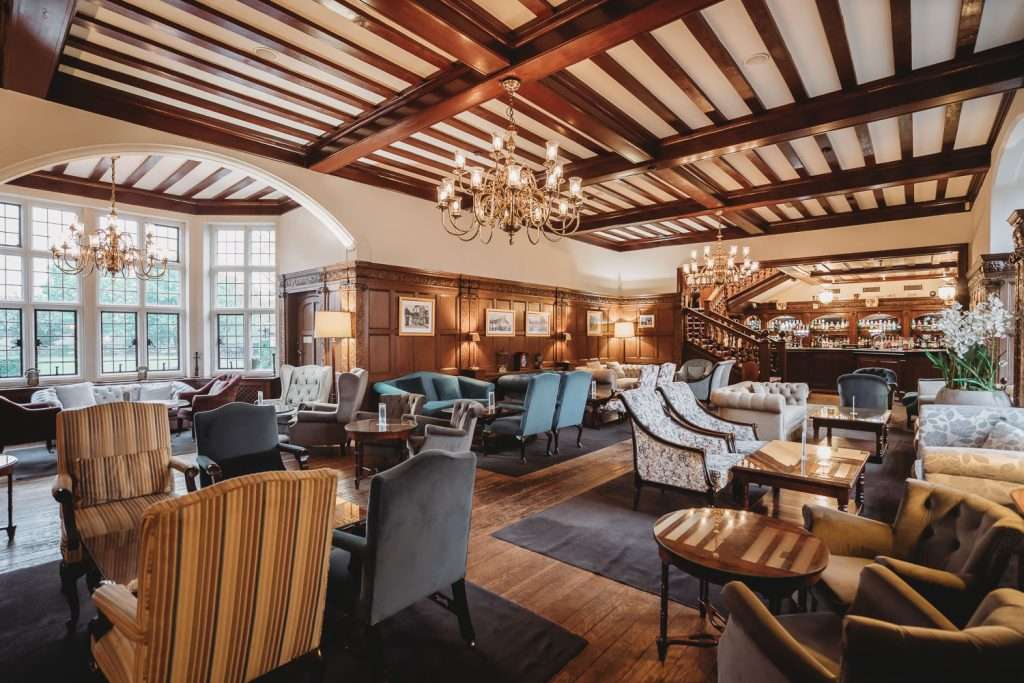 Wide view of the Lounge Bar at Greenwoods Hotel with plush seating and classic décor, ideal for relaxing with drinks in Essex.