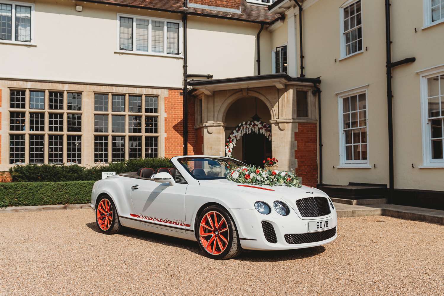Luxury wedding car outside Greenwoods Hotel in Essex, highlighting the venue’s elegant setting and convenient location for couples seeking a dry hire wedding venue near London.