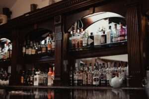 Traditional hotel bar with spirits and drinks available for wedding receptions and celebrations at Greenwoods Hotel and Spa.