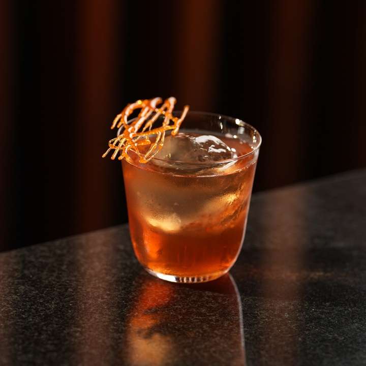 Elegant signature cocktail served at a wedding reception.